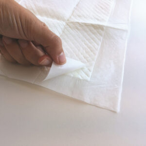Puppy Pads met Plakstrip